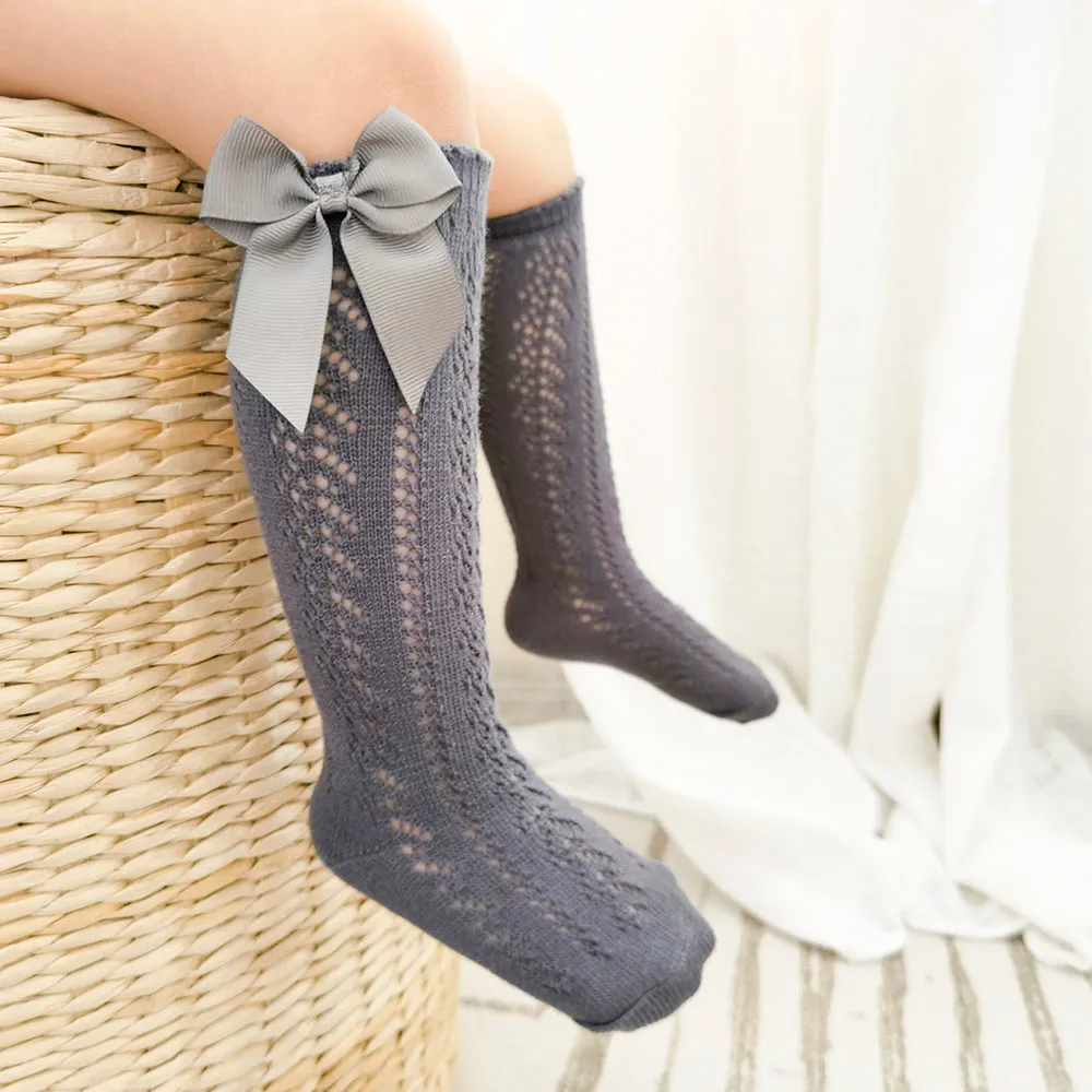 Lace cable bow knee high socks